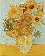 vase with fifteen sunflowers 